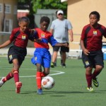 Young footballers entertain with hard-fought matches