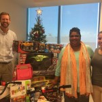 Law firm donates gifts to foster home