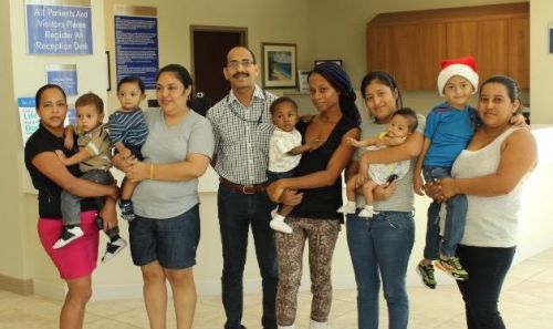 Dr Binoy Chattuparambil with his young patients after their surgeries