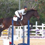 Serpell jumps to first by a second in equestrian event