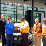 Lions Club raffle winner drives off with new car