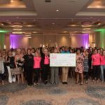 100 Women Who Care donate $24K to AIDS Foundation