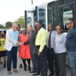 Couple donates bus to Cayman Academy