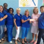 Pink Ladies deliver donations to Cayman groups