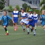 Cayman Prep footballers take girls opening rally