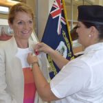 Governor pinned with first poppy
