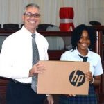 Cayman Academy student wins laptop