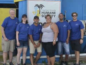 Nassau Re employees with Letty Blanco (centre) from the Humane Society